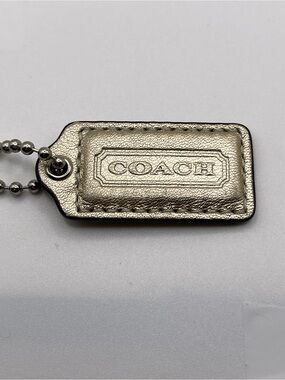 Coach Poppy Metallic SILVER Leather Hang Tag